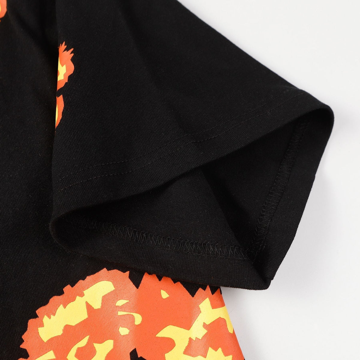 Denim Tears Black Oversized Tee With All Over Gradient Orange Flower Wreath Print