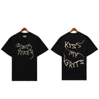 Denim Tears Black Oversized Short Sleeve Tee with Gold Denim Tears Text Graphic