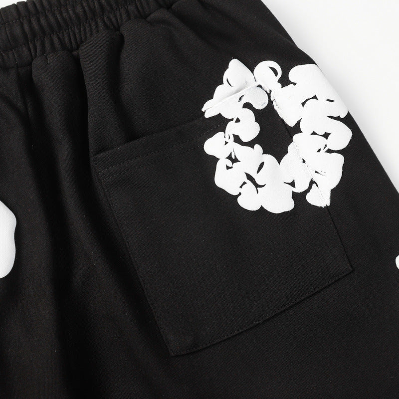 Denim Tears Black Cotton Sweat Shorts With White Textured Flower Wreath Print